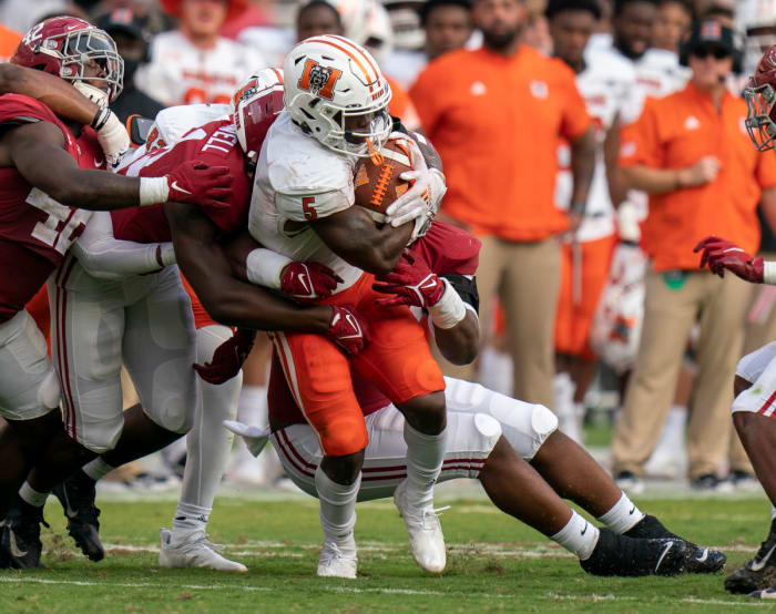 Sep 11, 2021; Tuscaloosa, Alabama, USA; Mercer Bears running back Fred Davis (5) is taken down from behind by the Alabama Crimson Tide defense at Bryant-Denny Stadium. Mandatory Credit: Marvin Gentry-USA TODAY Sports